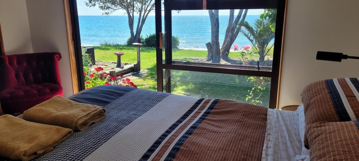Beachfront Bliss - Your Parapara Seaside Retreat Exterior photo
